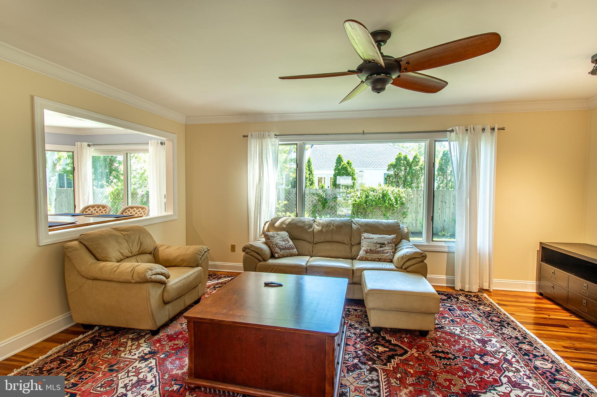 102 Jacks Point Road Oxford, MD 21654 - Photo 26 of 83 a living room with furniture and a large window