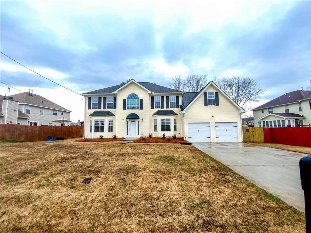 2428 Waters Run Decatur, GA 30035 - Photo 1 of 1 a front view of a house with a yard