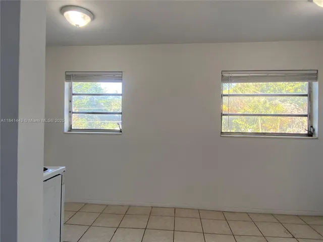 a front view of a house with yard