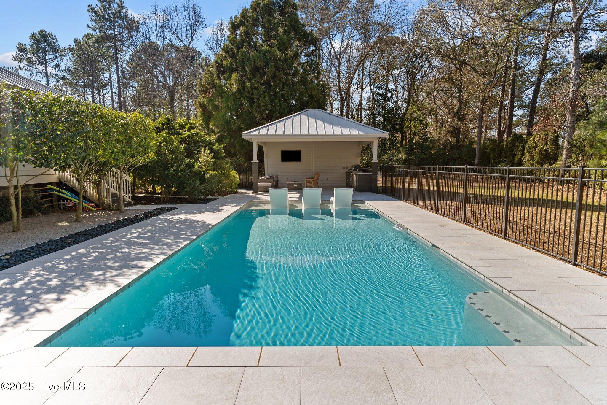 605 Ravenswood Road Hampstead, NC 28443 - Photo 15 of 55 Heated Pool