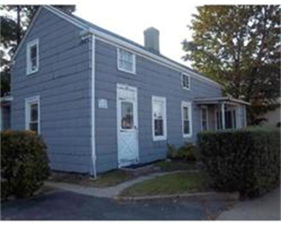 37 Stafford Road Fall River, MA 02721 - Photo 1 of 1 a front view of a house with a garden