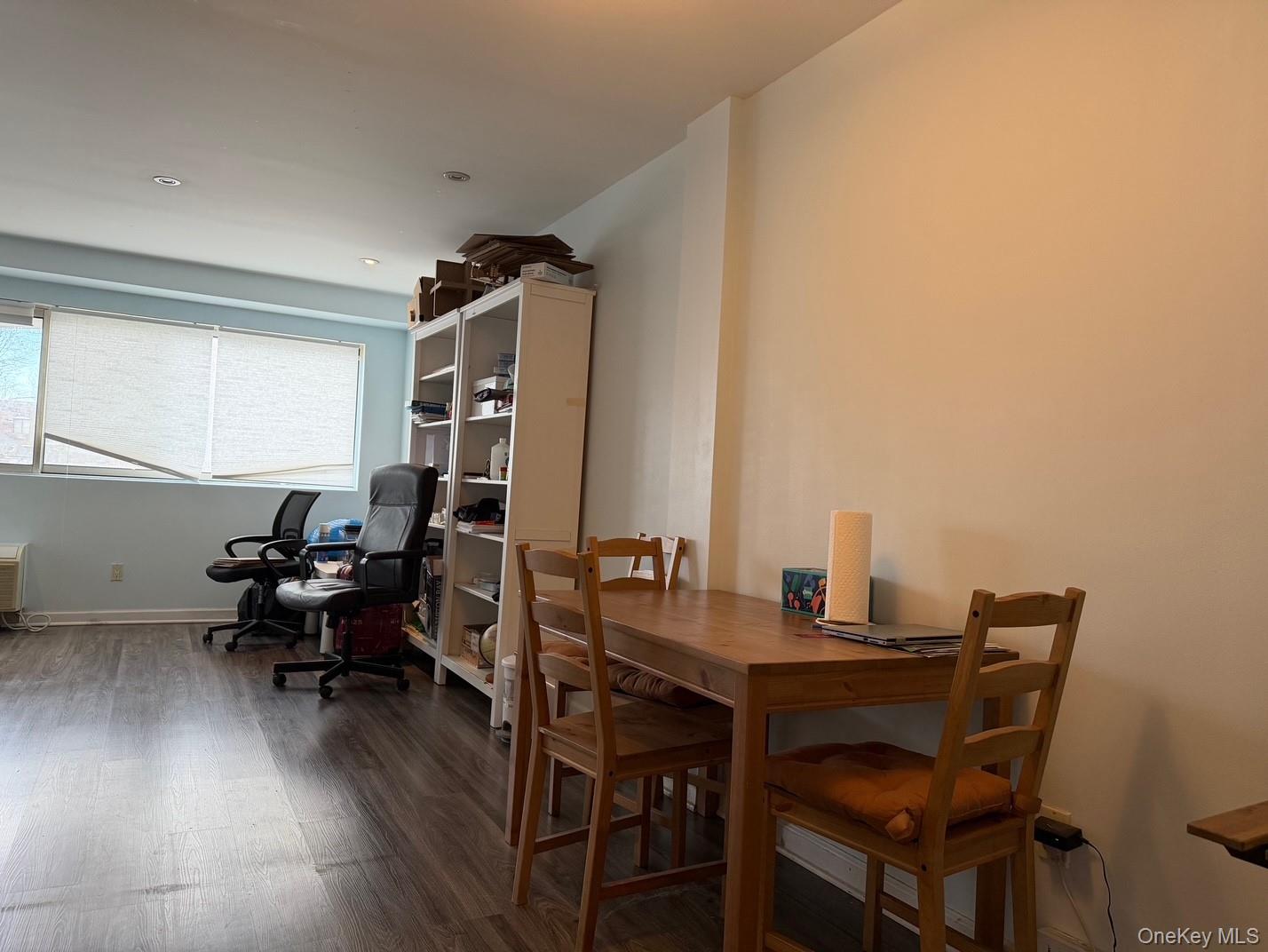 88 Cutter Mill Road, Unit 308 Great Neck, NY 11021 - Photo 4 of 15 Dining space with wood finished floors and recessed lighting
