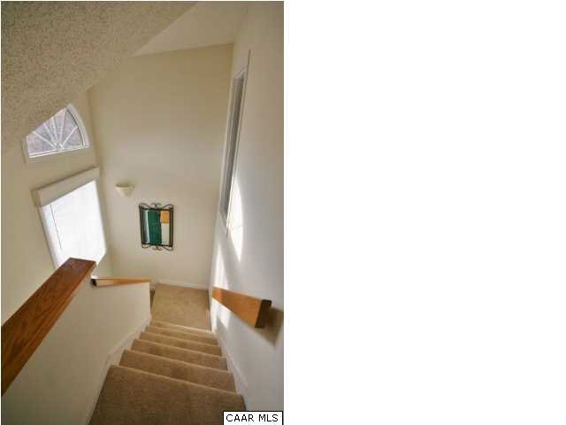 2012 Stone Rdg Wds Roseland, VA 22967 - Photo 14 of 19 a bedroom with a bed and a painting