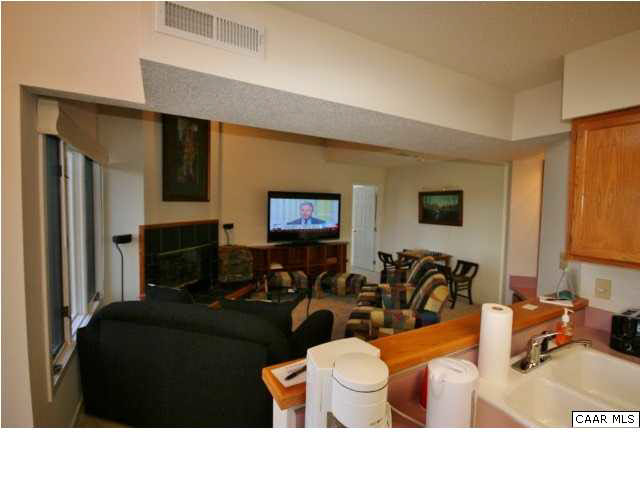 2012 Stone Rdg Wds Roseland, VA 22967 - Photo 5 of 19 a living room with furniture and a flat screen tv