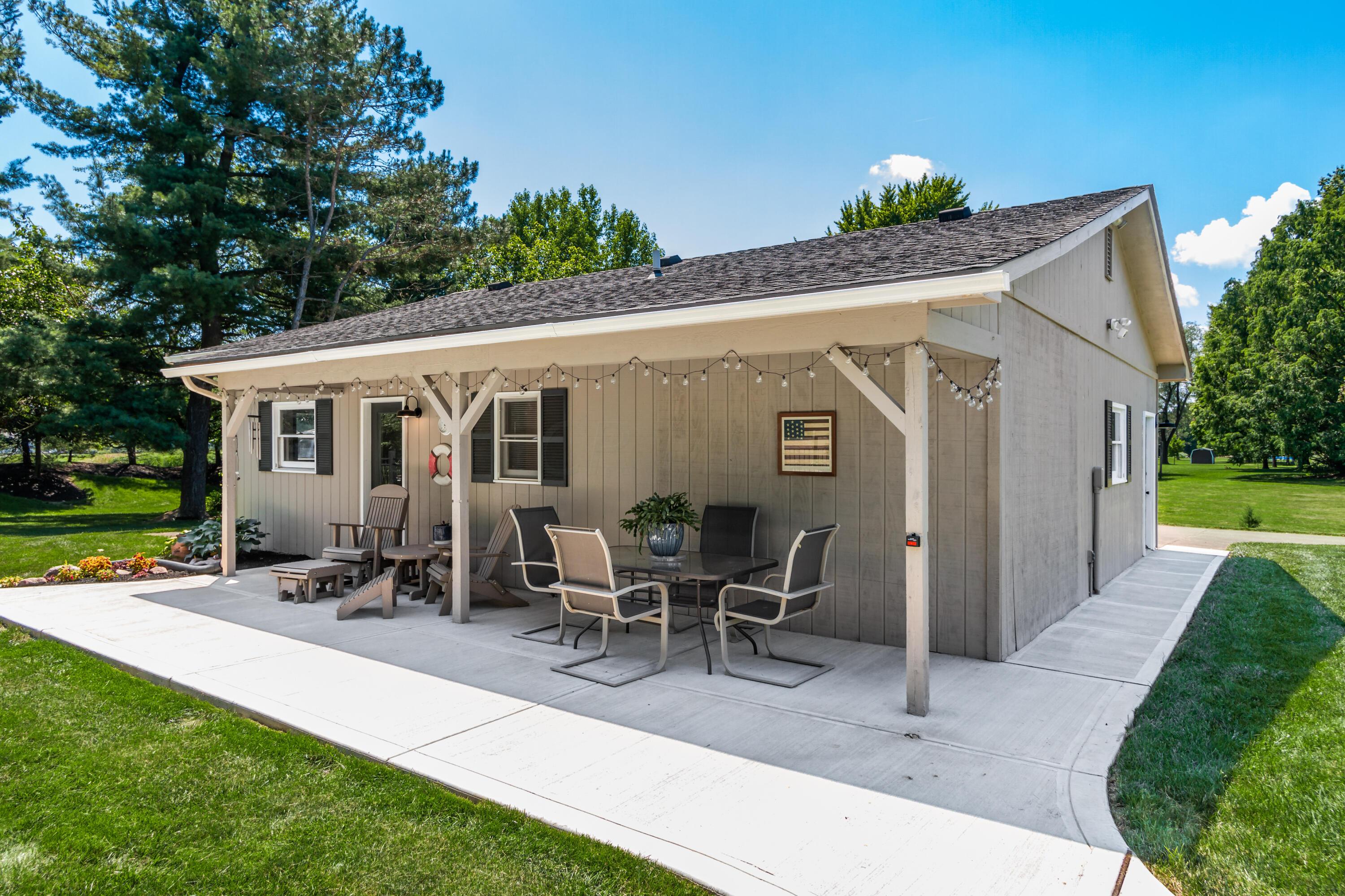 5165 Tussic St Road Westerville, OH 43082 - Photo 17 of 62 This multi purpose 3 car garage includes a bathroom, toolroom, closet, work sink, refrigerator, and space for a workshop. Auto openers. Covered area for enjoying the pool