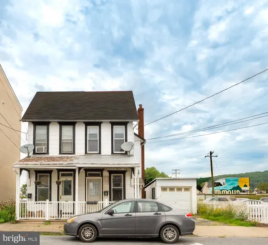 a car parked in front of a building