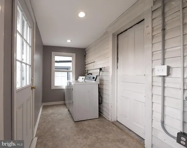 a view of livingroom with window and hardwood floor