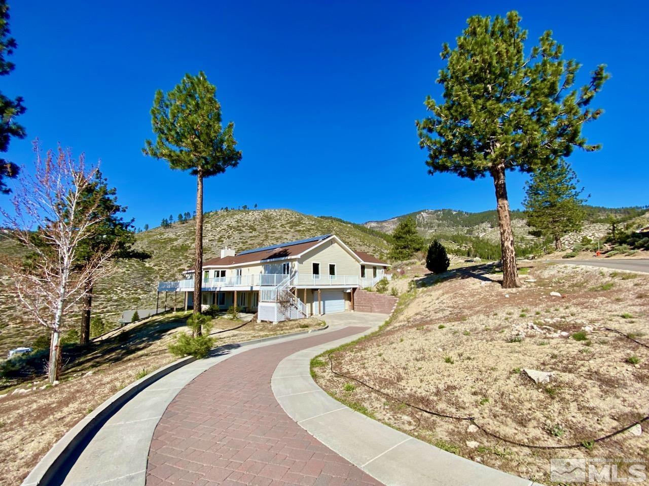 3807 Paradise View Carson City, NV 89703 - Photo 2 of 40 a front view of a house with a yard