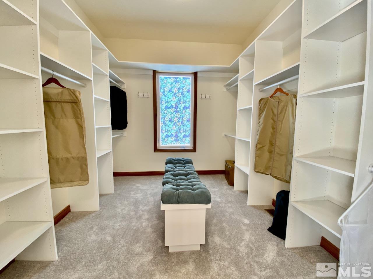 3807 Paradise View Carson City, NV 89703 - Photo 22 of 40 a hallway with a couch and a window