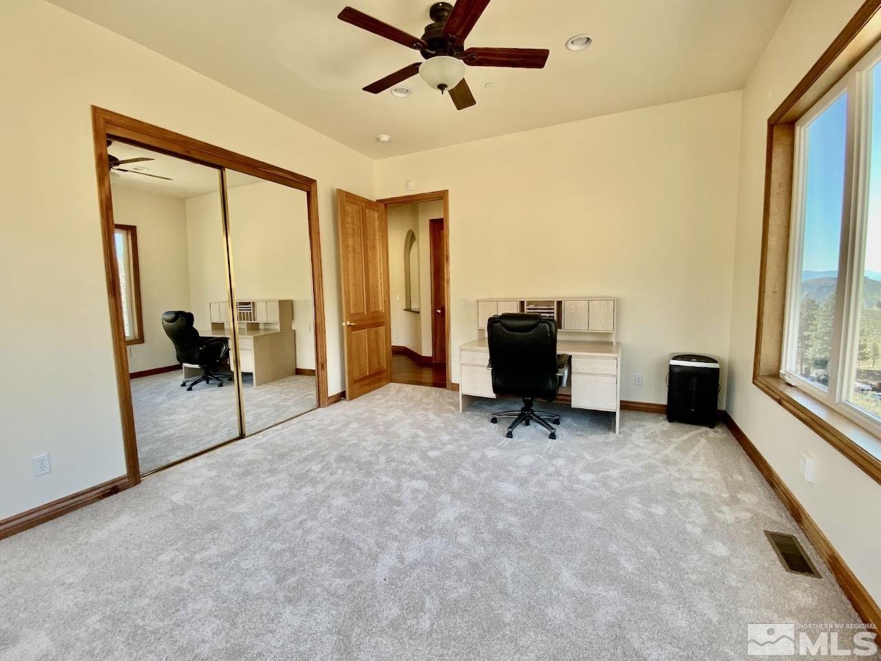 3807 Paradise View Carson City, NV 89703 - Photo 26 of 40 a view of workspace with furniture and a window