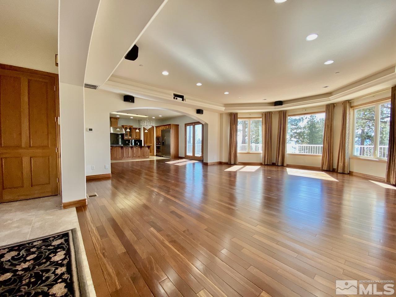 3807 Paradise View Carson City, NV 89703 - Photo 9 of 40 a big room with wooden floor and windows