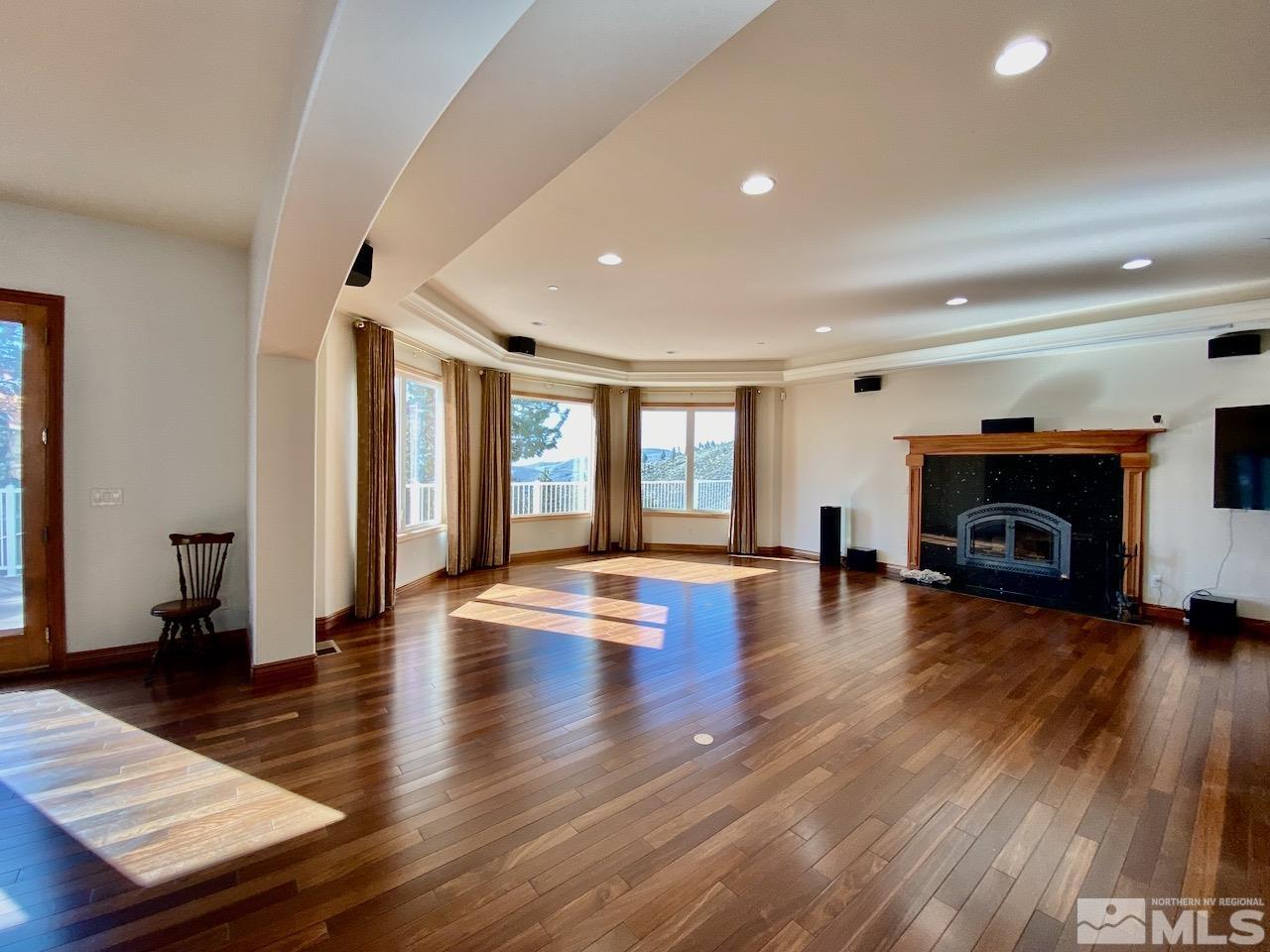 3807 Paradise View Carson City, NV 89703 - Photo 10 of 40 a living room with fireplace furniture and a wooden floor