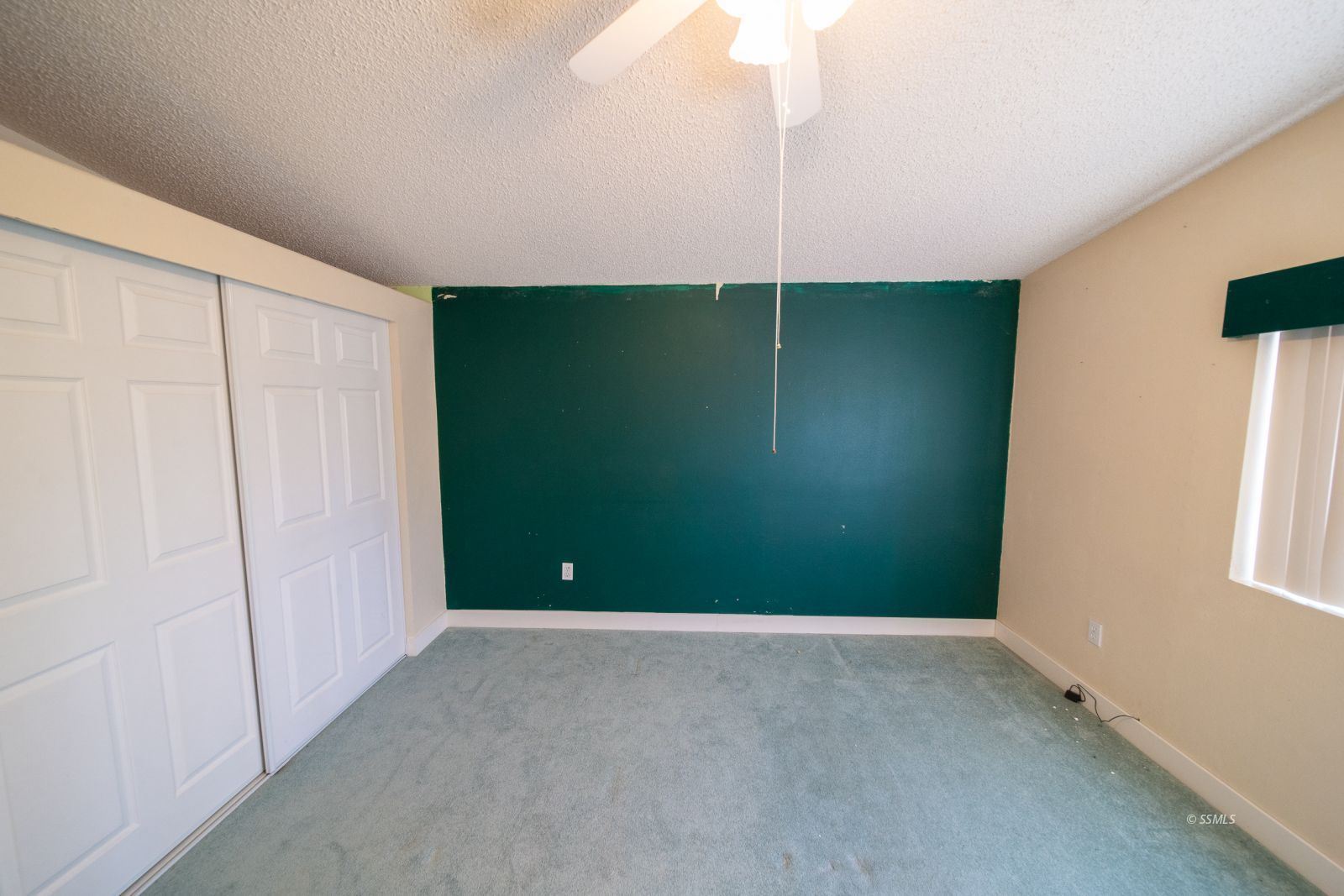 1219 South Garth Street Ridgecrest, CA 93555 - Photo 12 of 23 an empty room with windows