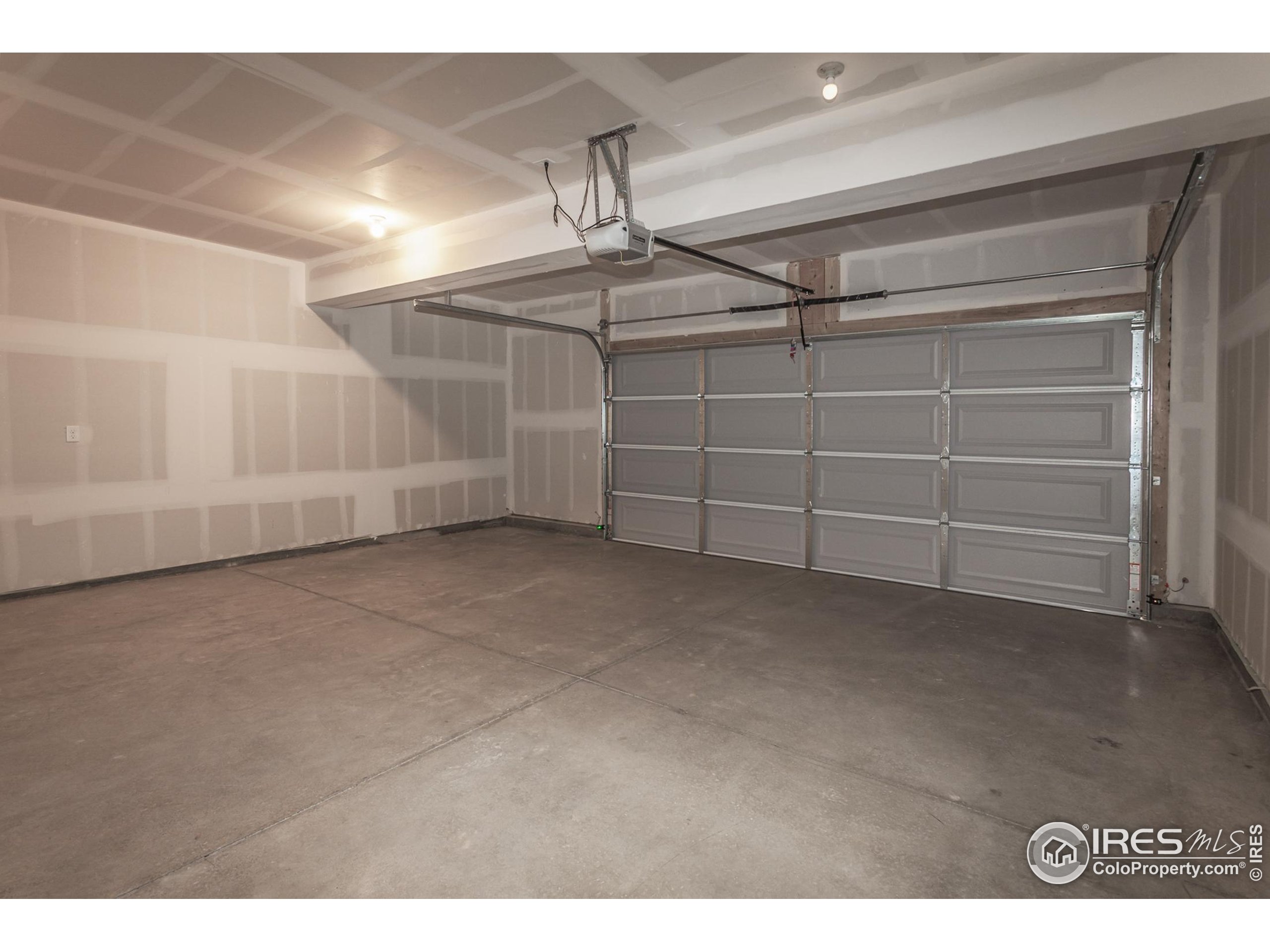 4909 Autumn Leaf Drive Timnath, CO 80547 - Photo 20 of 34 a view of a room with racks on the wall