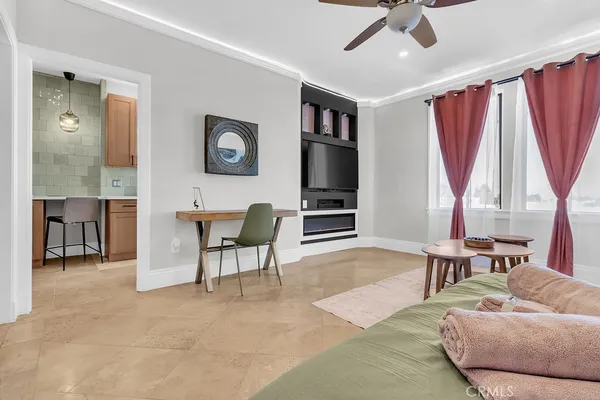a living room with furniture and a window