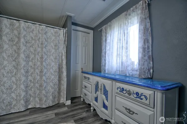 a view of a entryway with wooden floor