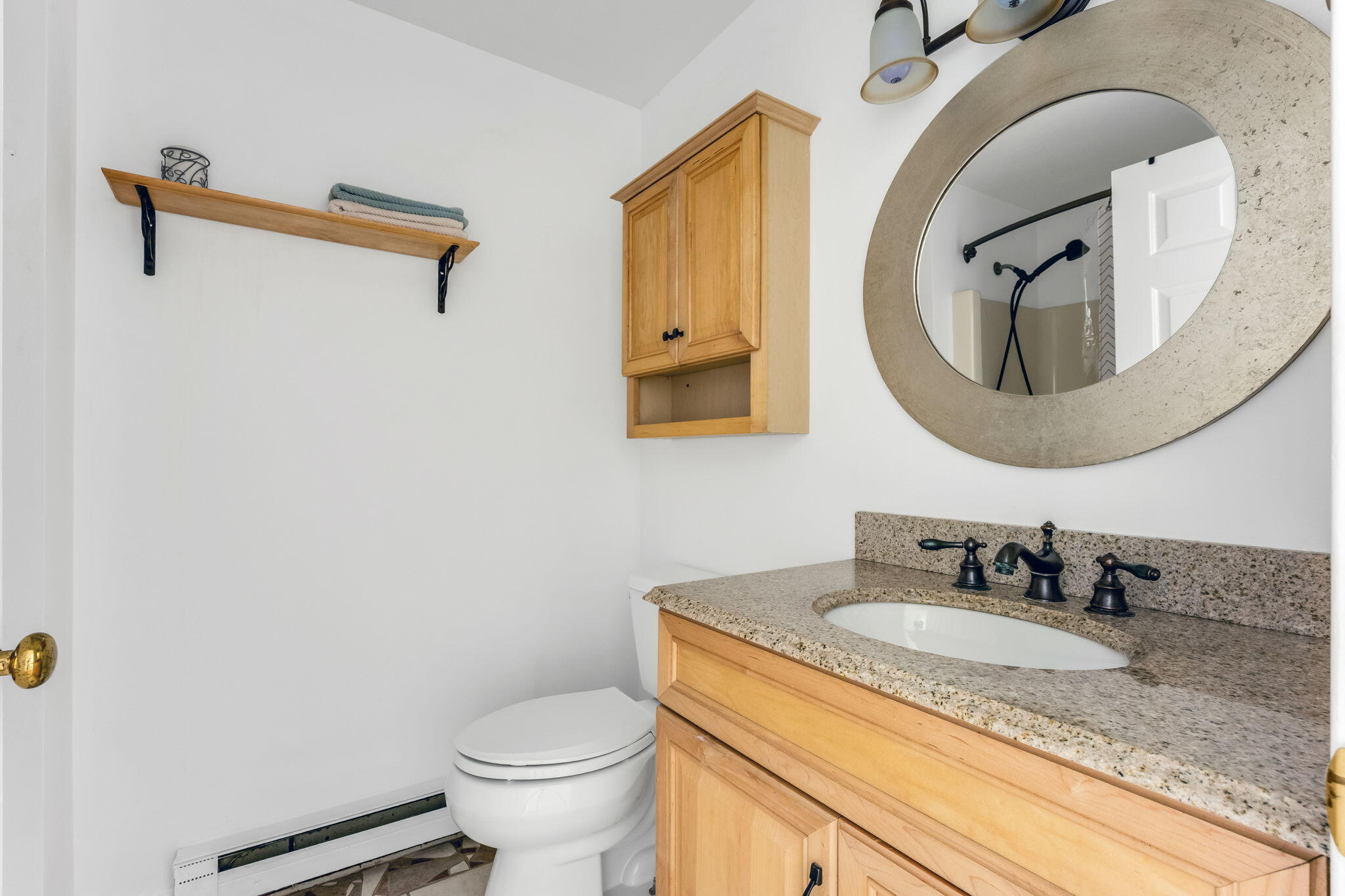 8 Bay Pine Road Harwich, MA 02645 - Photo 15 of 28 a bathroom with a granite countertop toilet sink and mirror