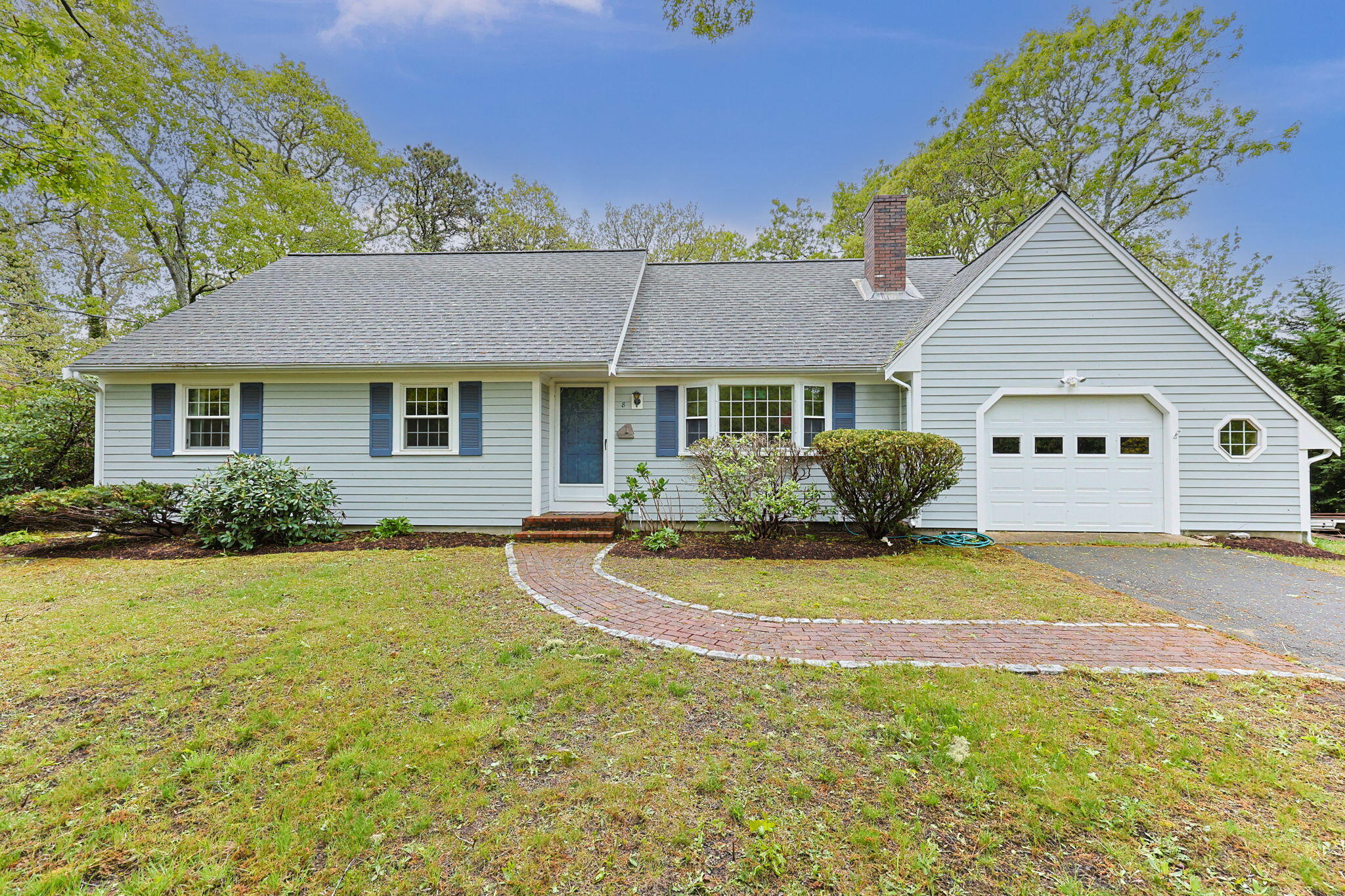 8 Bay Pine Road Harwich, MA 02645 - Photo 2 of 28 a view of a white house with a outdoor space