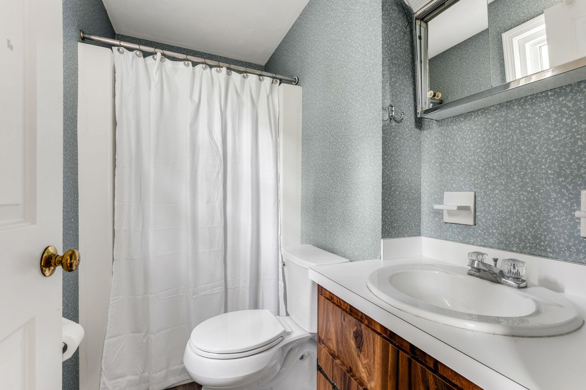 8 Bay Pine Road Harwich, MA 02645 - Photo 23 of 28 a bathroom with a granite countertop sink toilet and a mirror