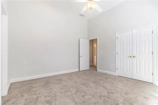 a view of a kitchen with a sink and a window