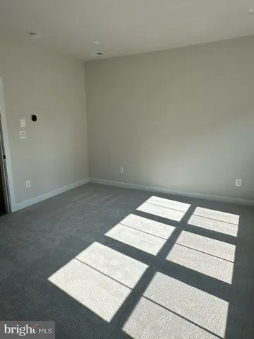 a bathroom with a shower sink vanity and mirror