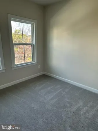 a bathroom with a sink and toilet