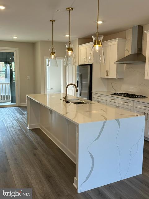 814 South Greenbrier Street Arlington, VA 22204 - Photo 6 of 27 a kitchen with kitchen island a sink stainless steel appliances and cabinets