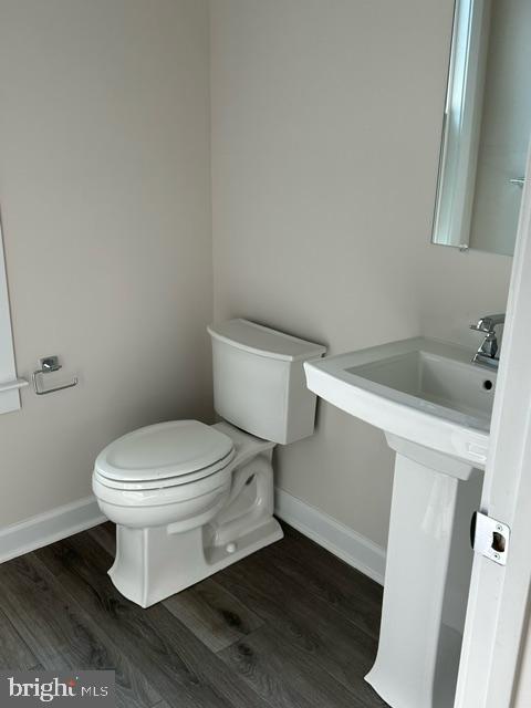 814 South Greenbrier Street Arlington, VA 22204 - Photo 8 of 27 a white toilet sitting next to a white sink