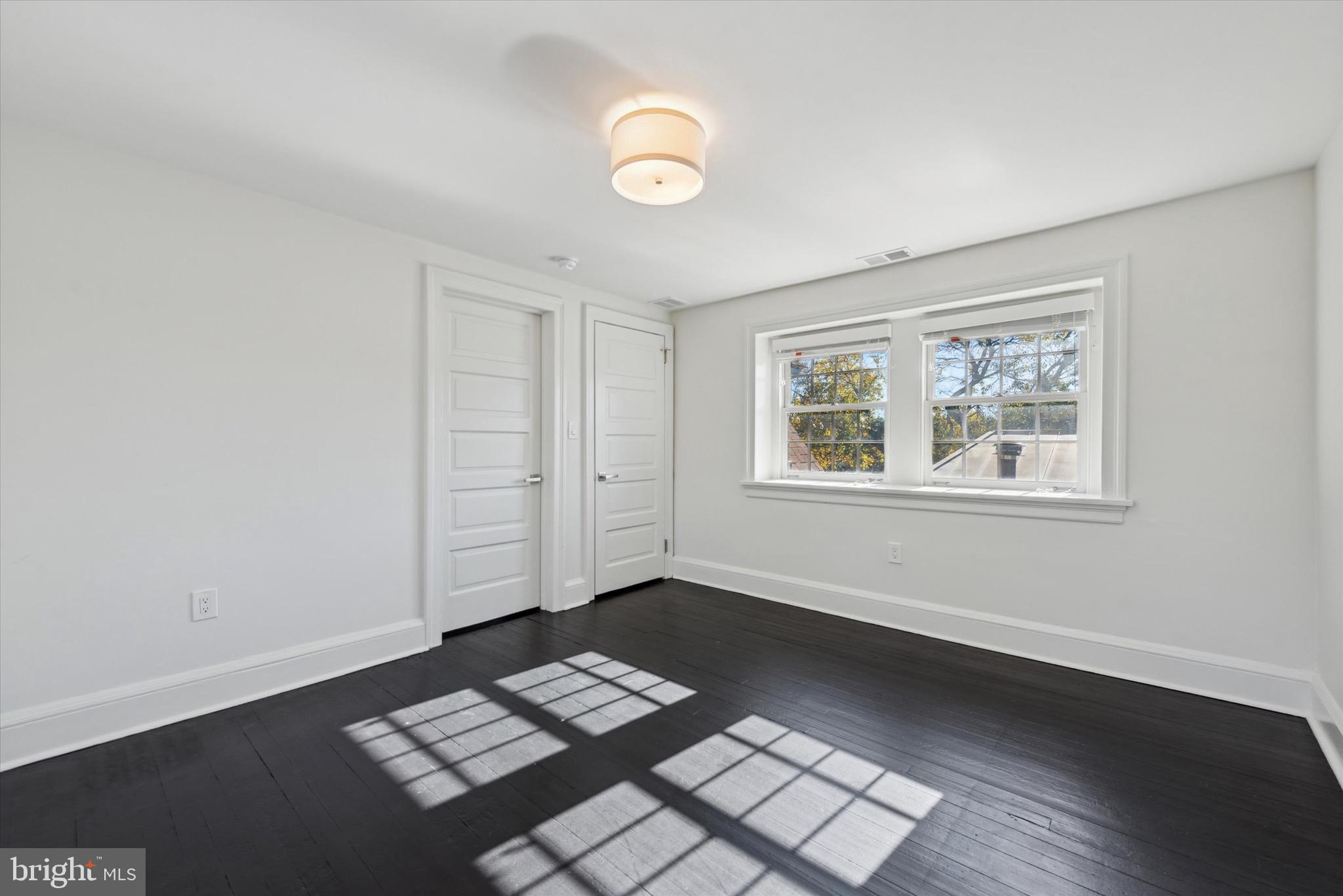 767-769 Newtown Road Villanova, PA 19085 - Photo 21 of 26 a view of workspace with wooden floor and window