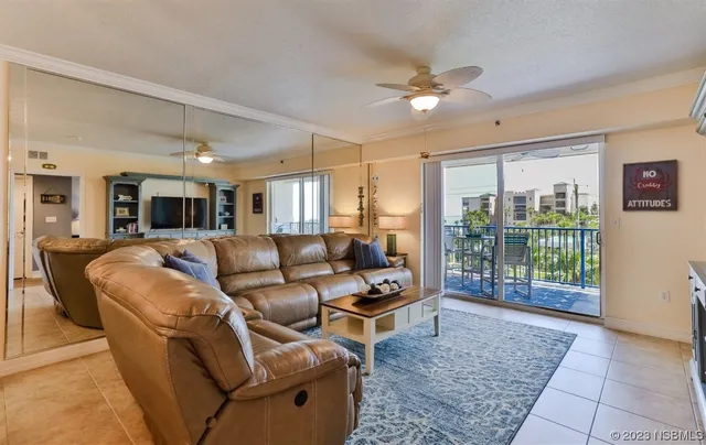 a view of a balcony with furniture
