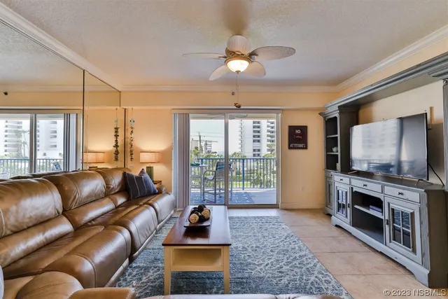 a view of staircase with a table and chairs