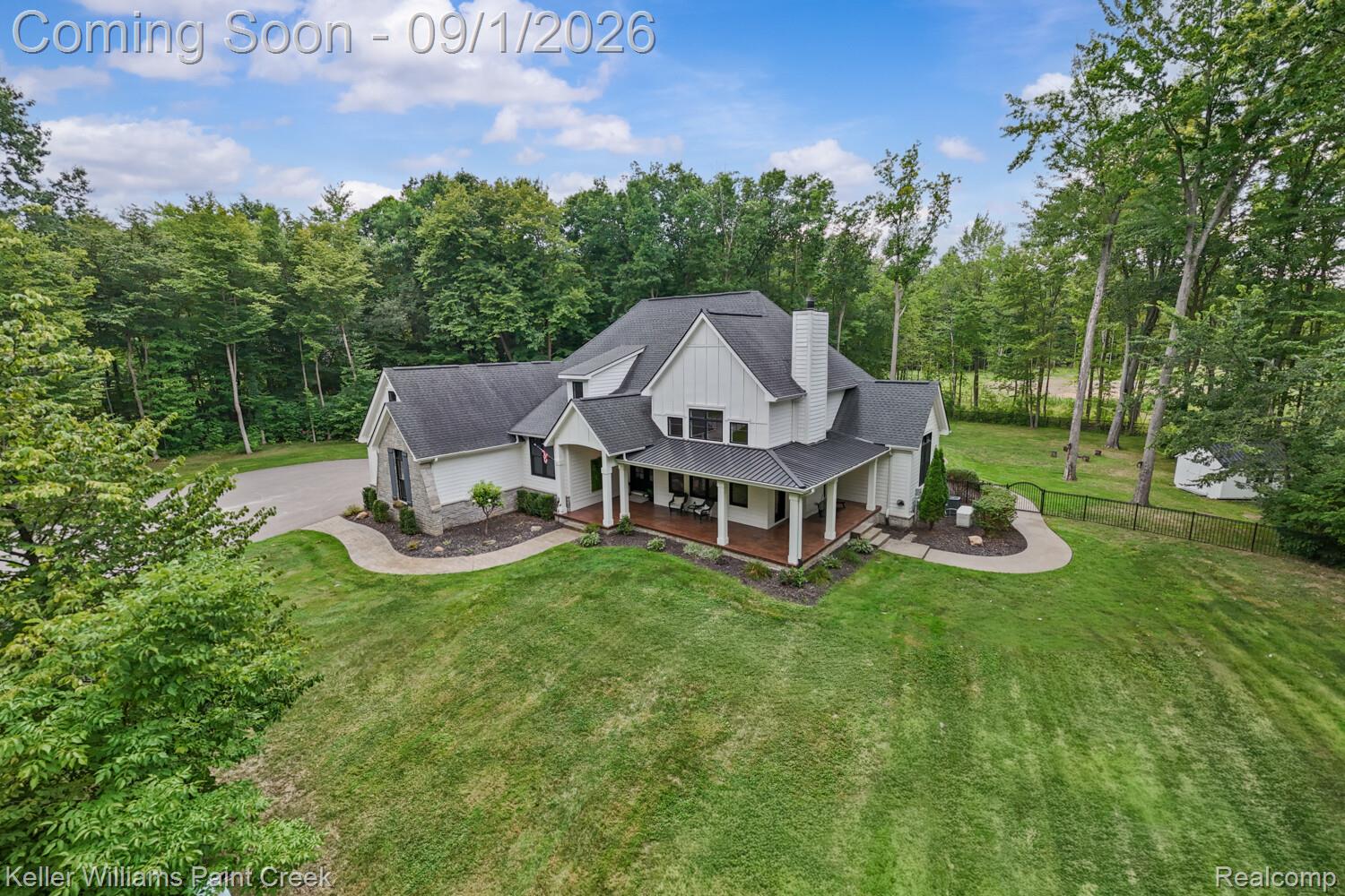 66927 Campground Road Washington, MI 48095 - Photo 1 of 60 Prestigious setting on this 2018 Built home with 51 x 14 covered wrap around porch , Porch has freshly sealed wood plank look stamped concrete