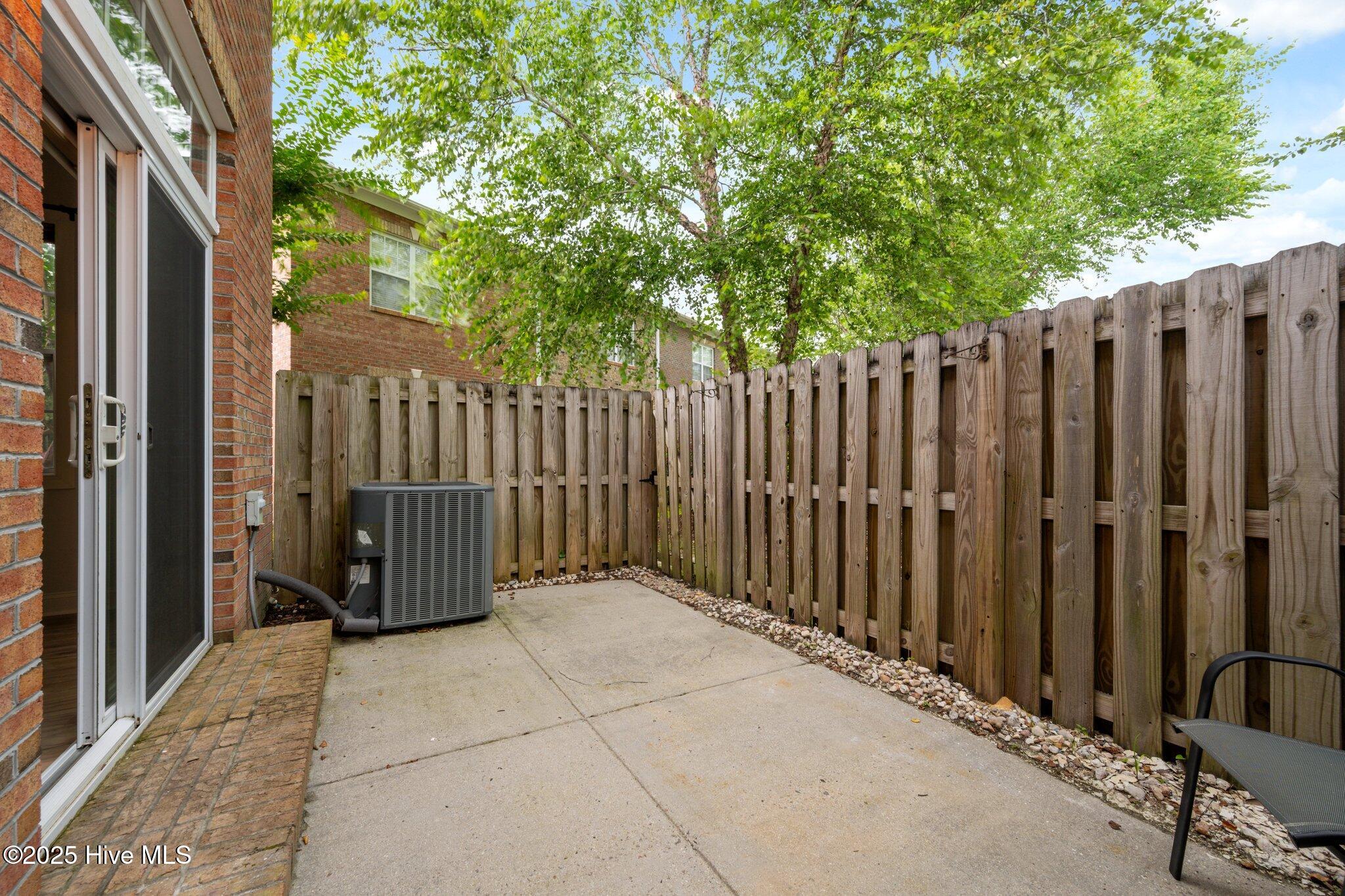 5147 Exton Park Loop Castle Hayne, NC 28429 - Photo 24 of 27 Fenced in Patio 2