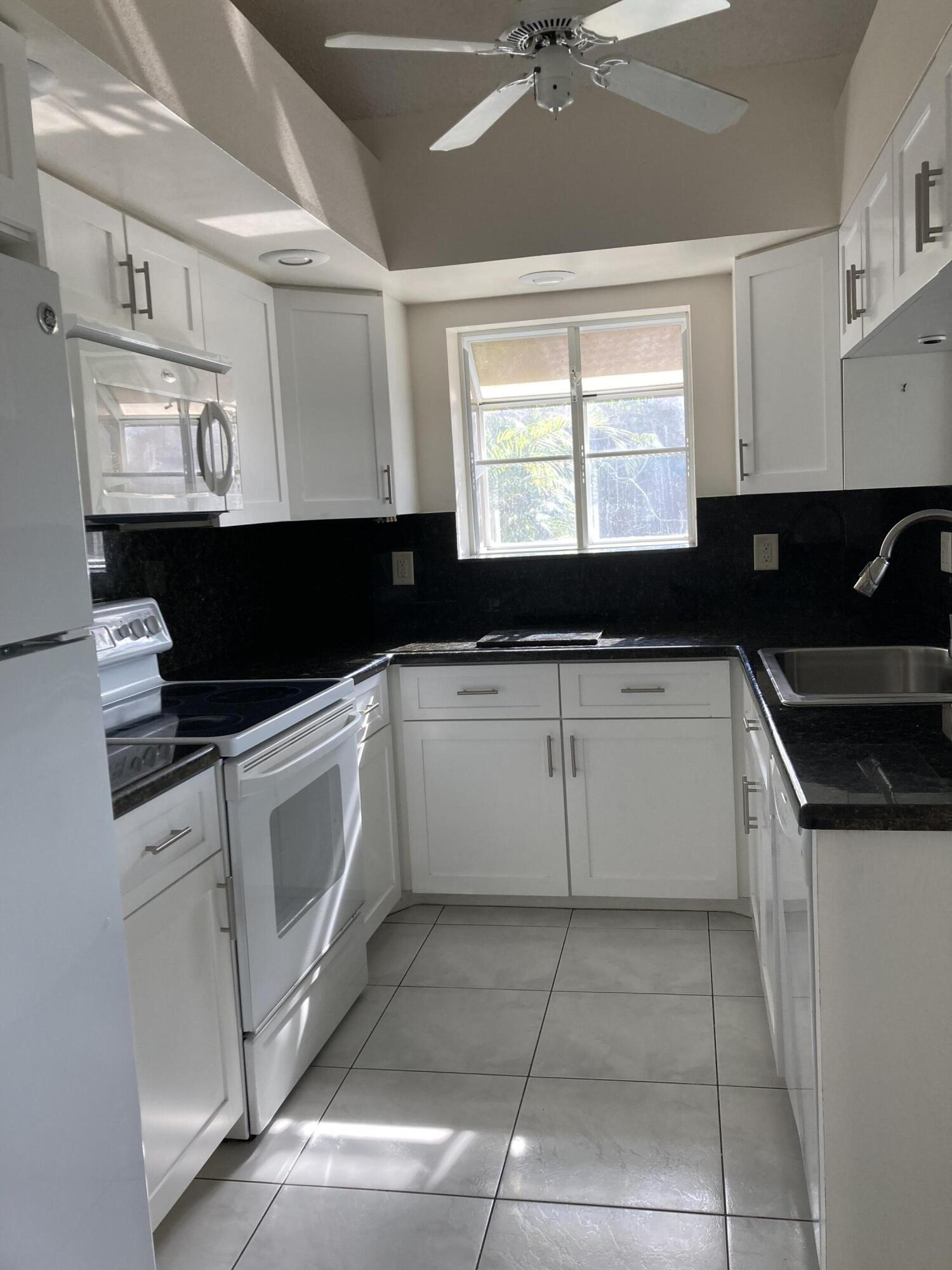 11000 Ladera Lane, Unit A Boca Raton, FL 33498 - Photo 9 of 11 kitchen