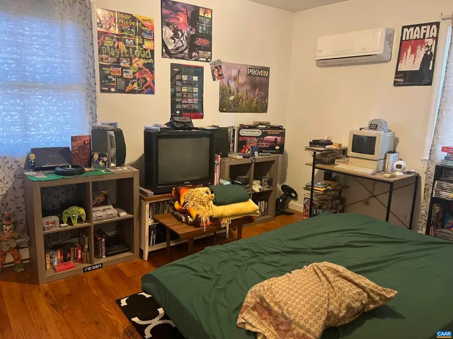 a view of a workspace with furniture and toys