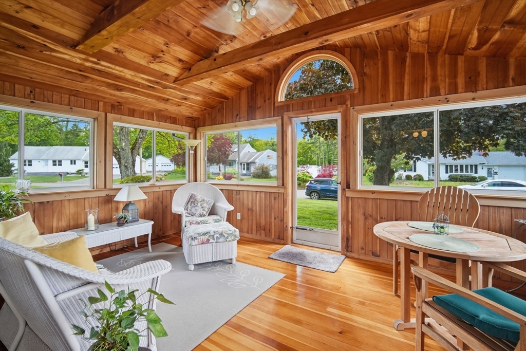 30 Birch Hill Road Northampton, MA 01062 - Photo 5 of 42 a balcony with furniture and a large window