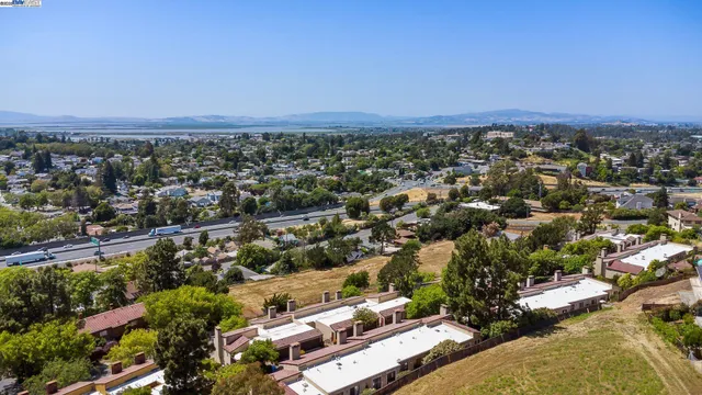 an aerial view of a city with lots of residential buildings