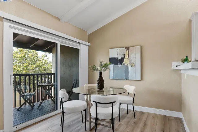 a workspace with furniture and wooden floor