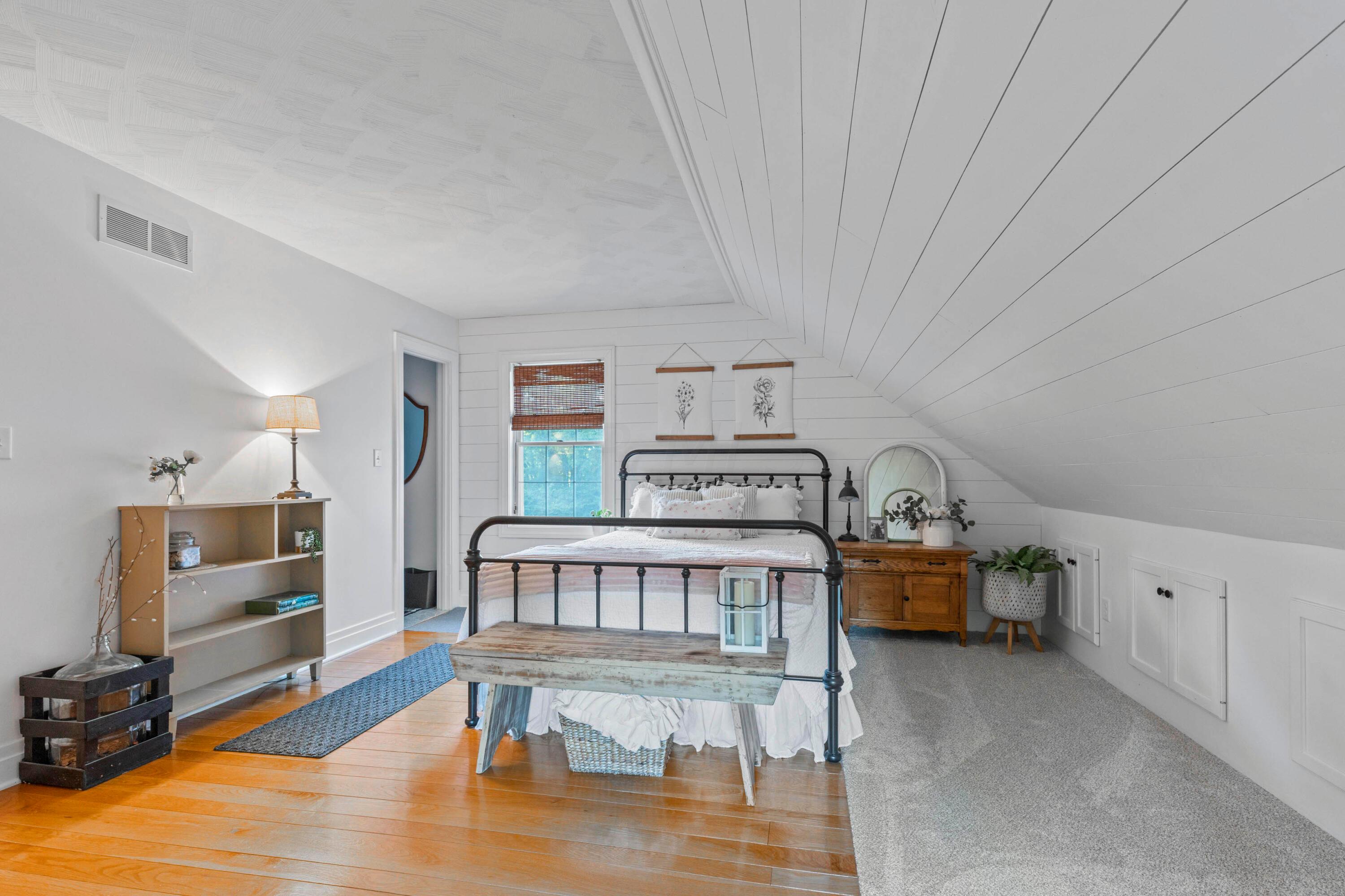6262 Duffy Road Delaware, OH 43015 - Photo 45 of 96 • Hardwood flooring
• White painted &
shiplap walls
• Angled ceiling
• Attic access
• Shades remain