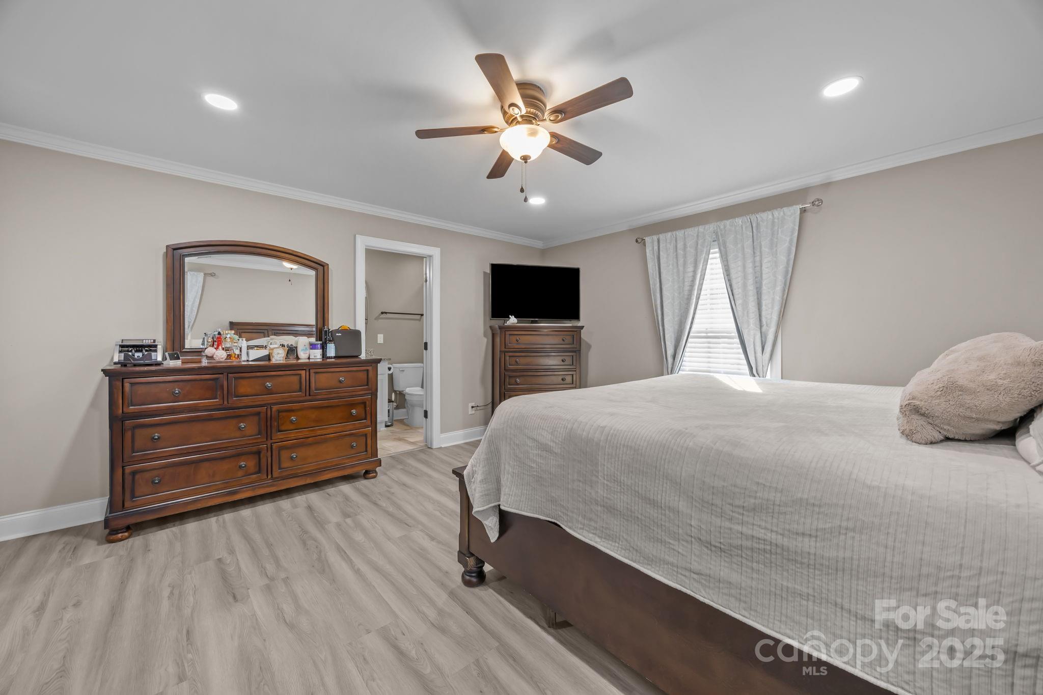 4255 Marshall Road Rock Hill, SC 29730 - Photo 15 of 43 a bedroom with a bed and a dresser