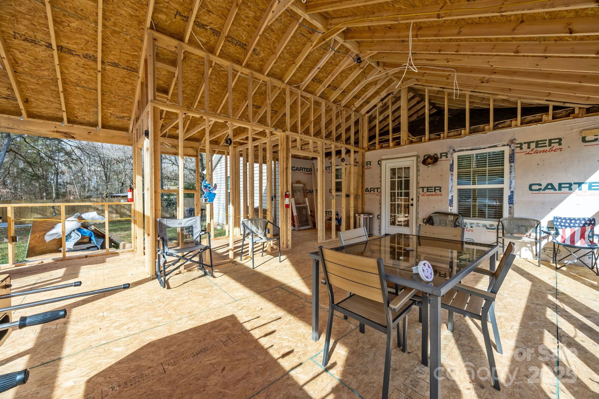4255 Marshall Road Rock Hill, SC 29730 - Photo 30 of 43 a view of a patio with table and chairs and potted plants
