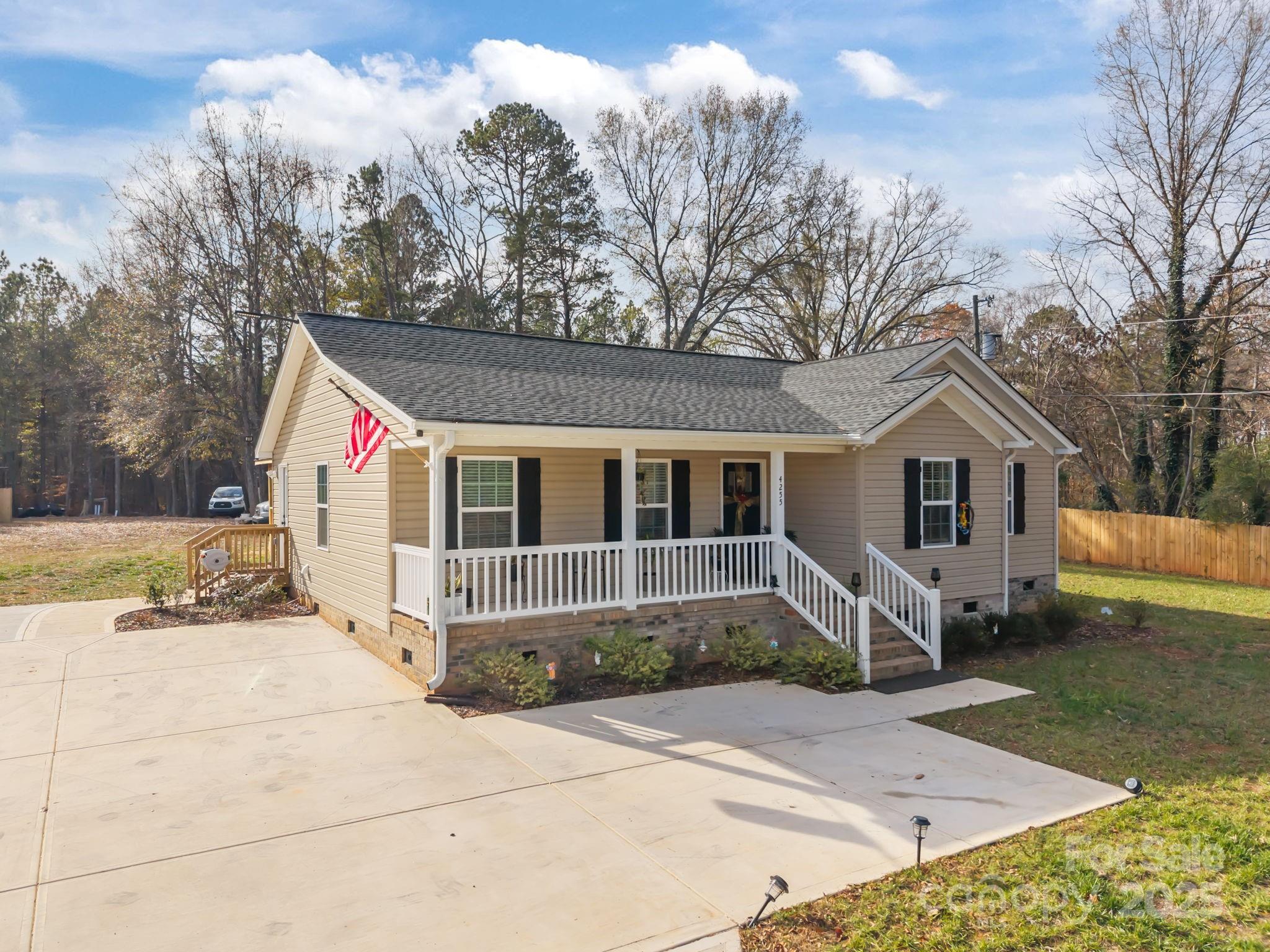 4255 Marshall Road Rock Hill, SC 29730 - Photo 42 of 43 a front view of a house with a yard and garage