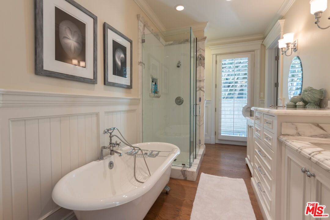 30760 Broad Beach Road Malibu, CA 90265 - Photo 25 of 41 a bathroom with a tub sink and mirror