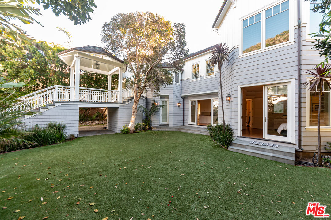 30760 Broad Beach Road Malibu, CA 90265 - Photo 27 of 41 a front view of a house with a garden