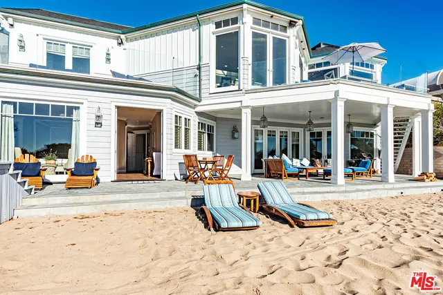 a view of a house with a ocean view