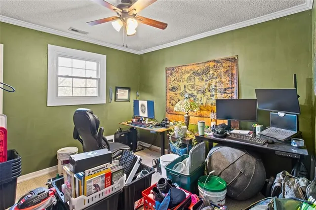 a workspace with furniture and a window