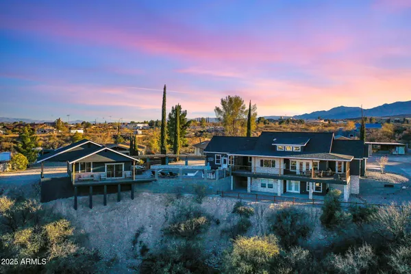 a view of a swimming pool with a lounge chairs