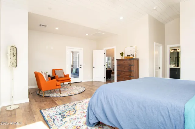 a bathroom with a shower and a sink