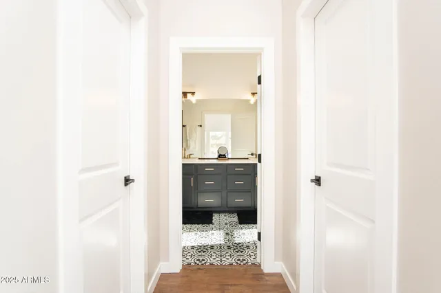 a blue room with a couch and a table