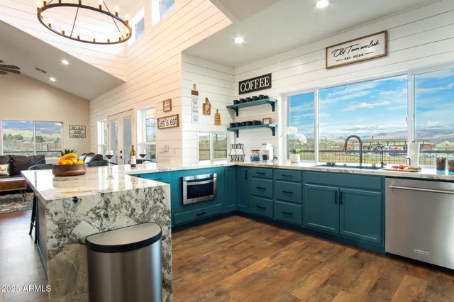a view of dining room with furniture window and wooden floor